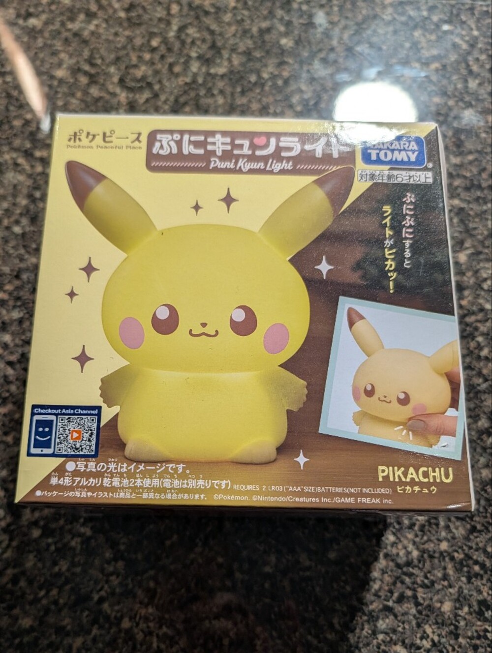 Takara Tomy Poképeace Puni Kyun Light (Pikachu)